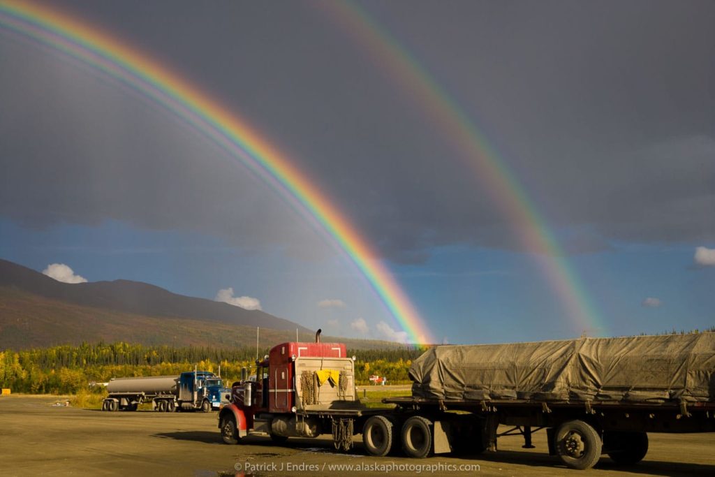 Rainbow over the Brooks Range mountains viewed from the Coldfoot truck stop parking lot, Arctic, Alaska.